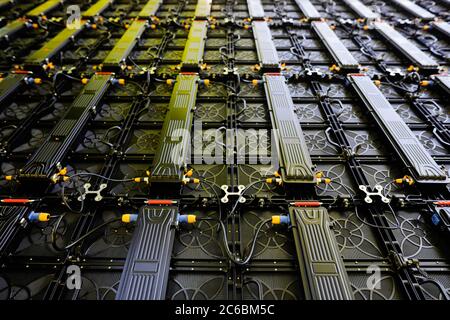 Details with the back of many screens forming one big outdoors display. Stock Photo