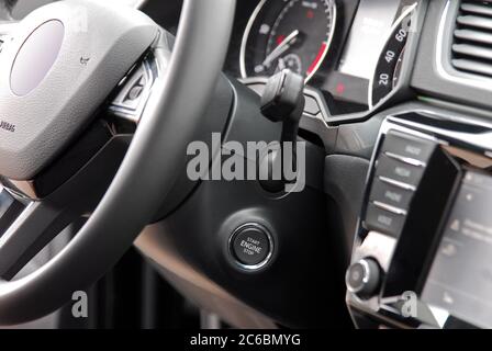 Start engine button, Start stop engine button on a modern car dashboard, Car engine start and stop button Stock Photo