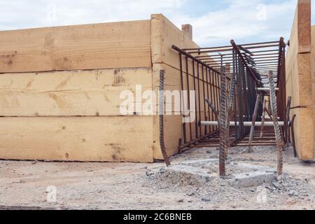 Cropped Reinforced concrete pile for the foundation of the building. Materials for construction. Concrete base of the building Stock Photo