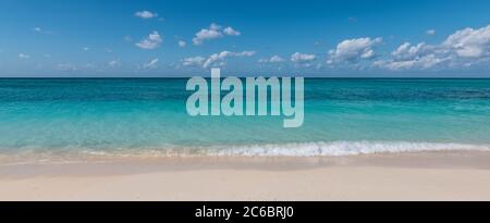 Panoramic view of tropical white sand beach and sea of the Cayman Islands. Stock Photo