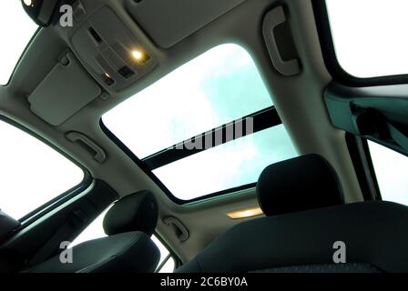 Panoramic double sunroof in a passenger car Stock Photo