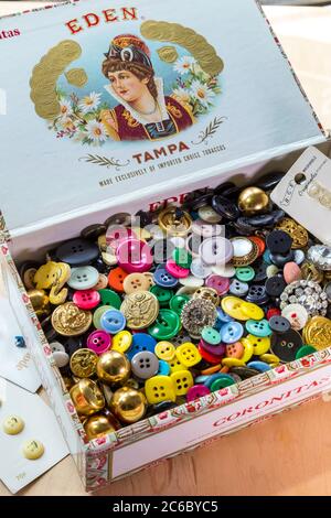 Vintage Button Collection in Old Cigar Box Stock Photo