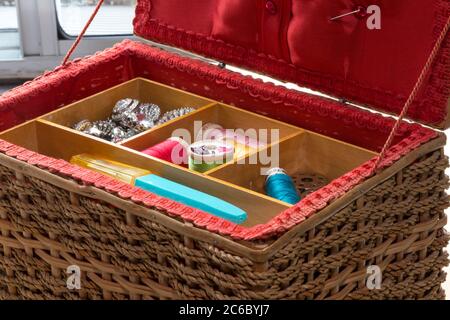 Vintage Sewing Basket with Sewing Notions Stock Photo