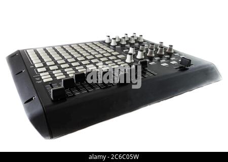 Studio Controller Desk for Electronic Music Production and Music Track Mixing. Shot on white background. Stock Photo