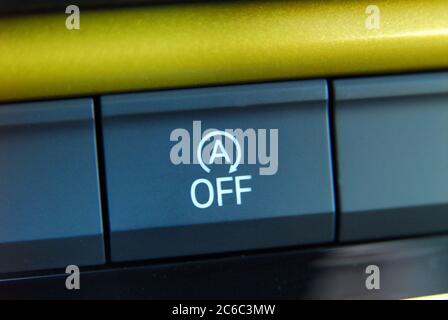 Stop-start system button. The stop-start system for more efficient fuel consumption. Stock Photo