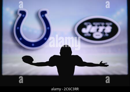 New York Jets. Silhouette of professional american football player. Logo of  NFL club in background, edit space Stock Photo - Alamy