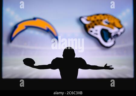 Los Angeles Chargers. Silhouette of professional american football player.  Logo of NFL club in background, edit space Stock Photo - Alamy