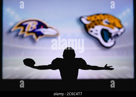 Baltimore Ravens vs. Jacksonville Jaguars. Fans support on NFL Game.  Silhouette of supporters, big screen with two rivals in background Stock  Photo - Alamy