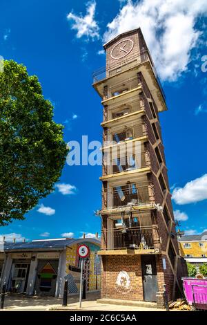 1950s clock tower at Chrisp Street Market in Poplar, London, UK Stock Photo