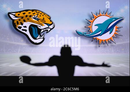 Miami Dolphins vs. Cincinnati Bengals. NFL Game. American Football League  match. Silhouette of professional player celebrate touch down. Screen in  bac Stock Photo - Alamy