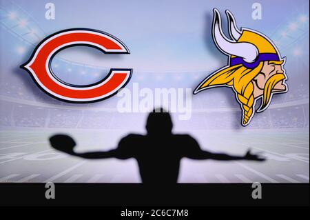 Chicago Bears vs. Detroit Lions. NFL Game. American Football League match.  Silhouette of professional player celebrate touch down. Screen in  background. Stock Photo