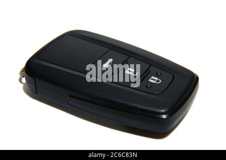 Black car key with remote central locking. Pop-up car key with remote central locking. Stock Photo