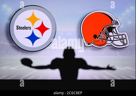 Pittsburgh Steelers vs. Cleveland Browns . NFL Game. American Football League match. Silhouette of professional player celebrate touch down. Screen in Stock Photo