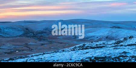 Steeperton Tor in winter from Higher Tor on Belstone Stock Photo