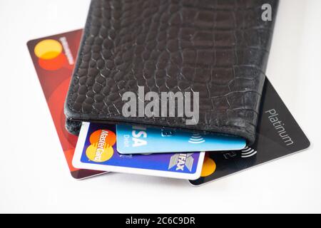 Closed wallet or purse with cards, debit, credit, bank - concept for cashless, no cash, no physical money, move towards cashless society, contactless Stock Photo