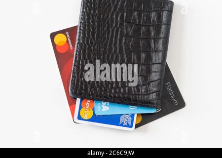 Closed wallet or purse with cards, debit, credit, bank - concept for cashless, no cash, no physical money, move towards cashless society, contactless, Stock Photo