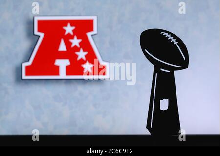 American Football Conference – AFC, professional american football club,  silhouette of NFL trophy, logo of the club in background Stock Photo - Alamy