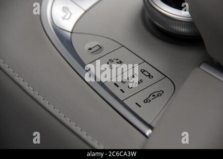 Suspension control for a modern passenger car in a button panel. Car panel buttons Stock Photo