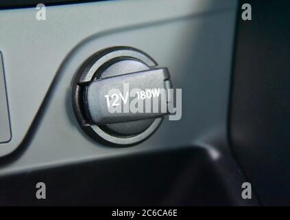 12V power outlet socket in the car Stock Photo