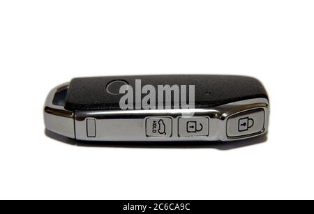 Black car key with remote central locking. Pop-up car key with remote central locking. Stock Photo