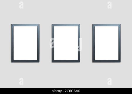 Blank photo frames on the wall. Black rectangular mockup frames for your presentation Stock Photo
