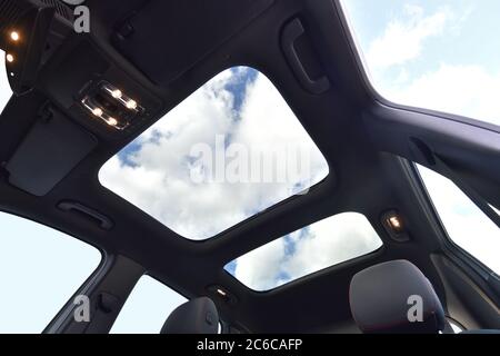 Panoramic double sunroof in a passenger car Stock Photo
