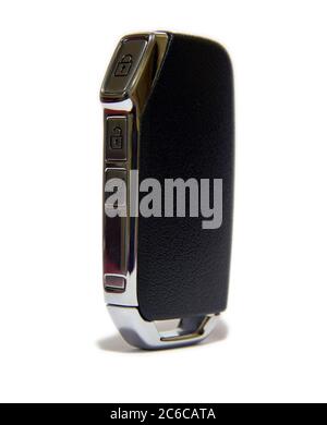 Black car key with remote central locking. Pop-up car key with remote central locking. Stock Photo