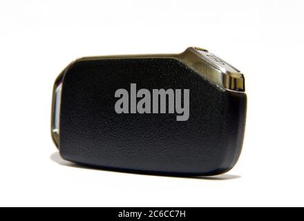 Black car key with remote central locking. Pop-up car key with remote central locking. Stock Photo