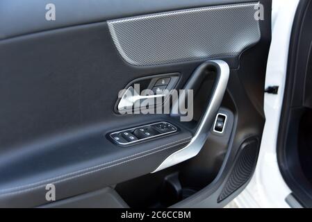 side mirror switch control, window control, central locking and car door handles Stock Photo