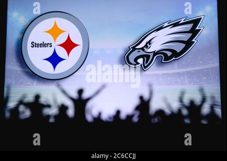 Green Bay Packers vs. Philadelphia Eagles. Fans support on NFL Game.  Silhouette of supporters, big screen with two rivals in background Stock  Photo - Alamy