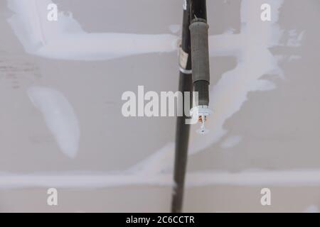 Close up automatic fire sprinkler fire on the ceiling in office building Stock Photo