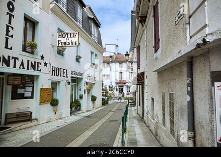 Lourdes, France - June 18, 2018: City street with a large number of hotels Stock Photo