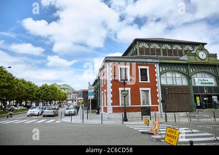 Lourdes, France - June 18, 2018: Road signs near the covered market building Stock Photo