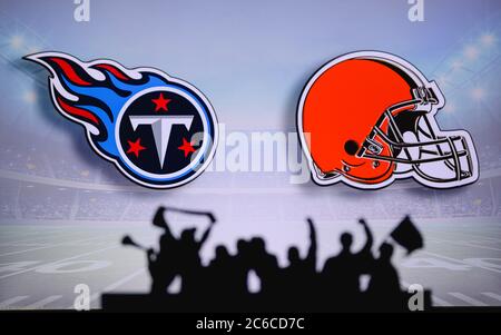 Denver Broncos vs. Tennessee Titans. NFL Game. American Football League  match. Silhouette of professional player celebrate touch down. Screen in  background. Stock Photo