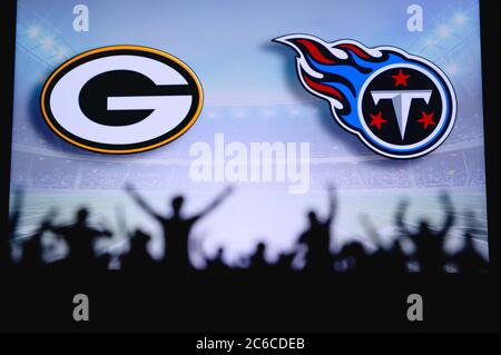 Tampa Bay Buccaneers vs. Green Bay Packers. Fans support on NFL Game.  Silhouette of supporters, big screen with two rivals in background Stock  Photo - Alamy