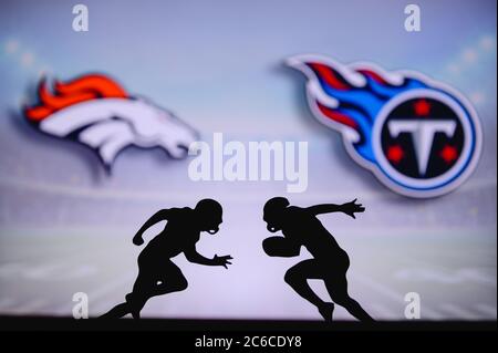 Tennessee Titans and Denver Broncos players join together in a Christmas  prayer on the 50 yard line following an NFL football game on December 25,  2004 at The Coliseum in Nashville, TN.