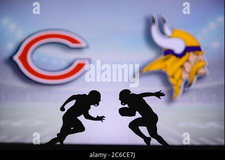 Chicago Bears vs. Minnesota Vikings. NFL Game. American Football League  match. Silhouette of professional player celebrate touch down. Screen in  background. Stock Photo