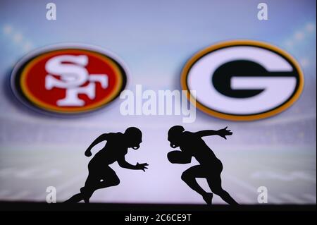 San Francisco 49ers vs. Green Bay Packers. NFL match poster. Two american football players silhouette facing each other on the field. Clubs logo in ba Stock Photo