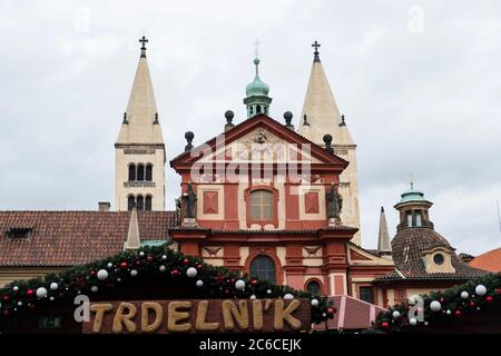 Trdelnik food vendor shop at a Christmas market at Prague Castle Stock Photo