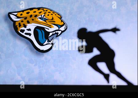 Jacksonville Jaguars professional american football club, silhouette of NFL  trophy, logo of the club in background Stock Photo - Alamy