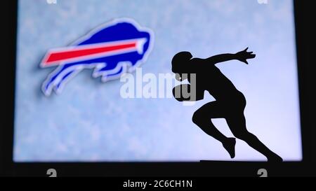 Buffalo Bills professional american football club, silhouette of NFL  trophy, logo of the club in background Stock Photo - Alamy