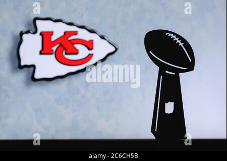 Kansas City Chiefs professional american football club, silhouette of NFL  trophy, logo of the club in background Stock Photo - Alamy