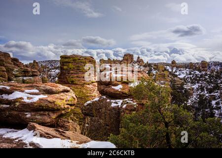 Storm clouds over the rhyolite rock formations at Chiricahua National Monument in southern, Arizona Stock Photo