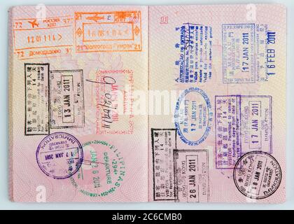 Russian passport with stamps on the border of different countries Stock Photo