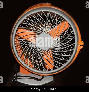 Portable mini table fan on black background Stock Photo
