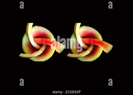 sliced watermelon isolated on black background