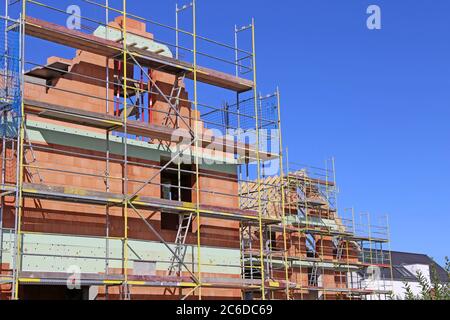 Building site with a detached house under construction Stock Photo