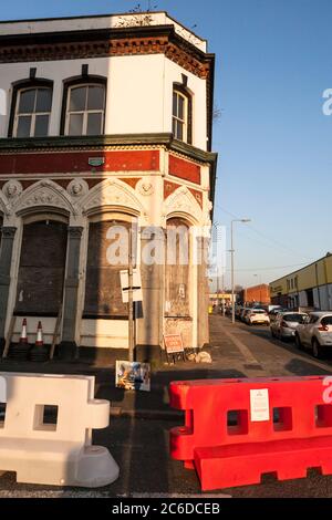 Business open as usual!  The long-closed Angel pub on the corner of Stanhope and Caryl Streets, Liverpool, England Stock Photo