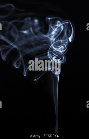 White smoke isolated on black background, abstract movement of smoke.