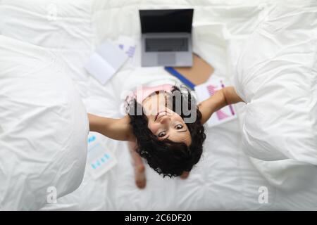 Young woman works remotely from home Stock Photo